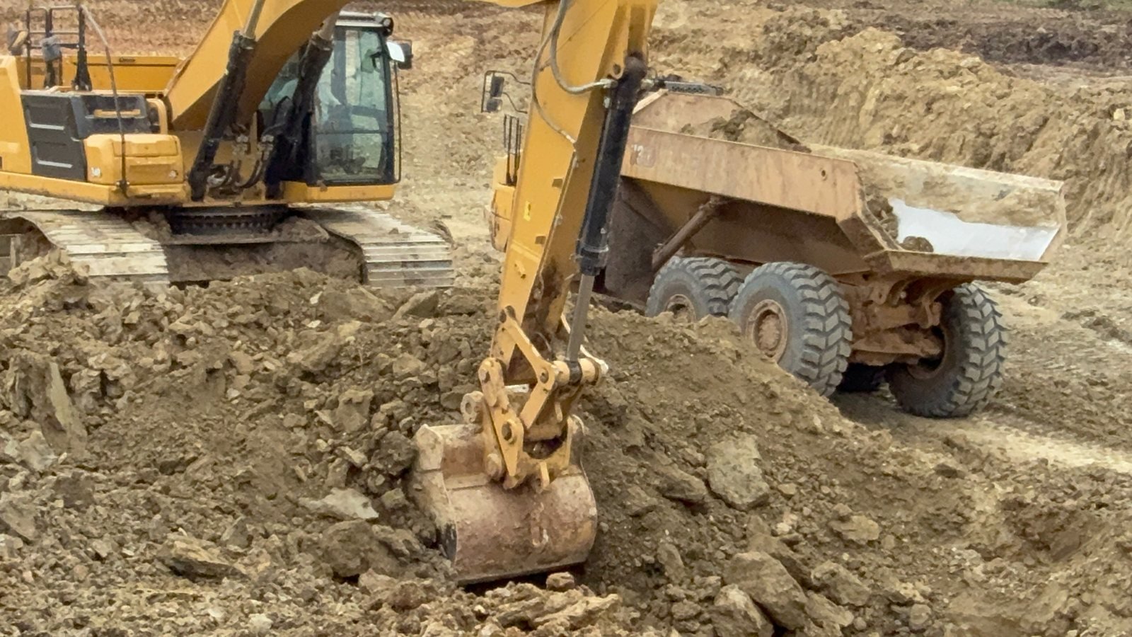 Excavation in progress on a custom barndominium build site